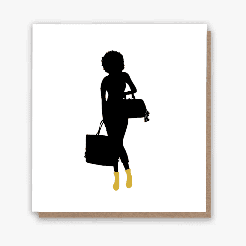 Afrocentric ‘Born to Shop’ greeting card with a youthful black woman in a trendy dress and yellow heels, exuding style and a love for fashion.