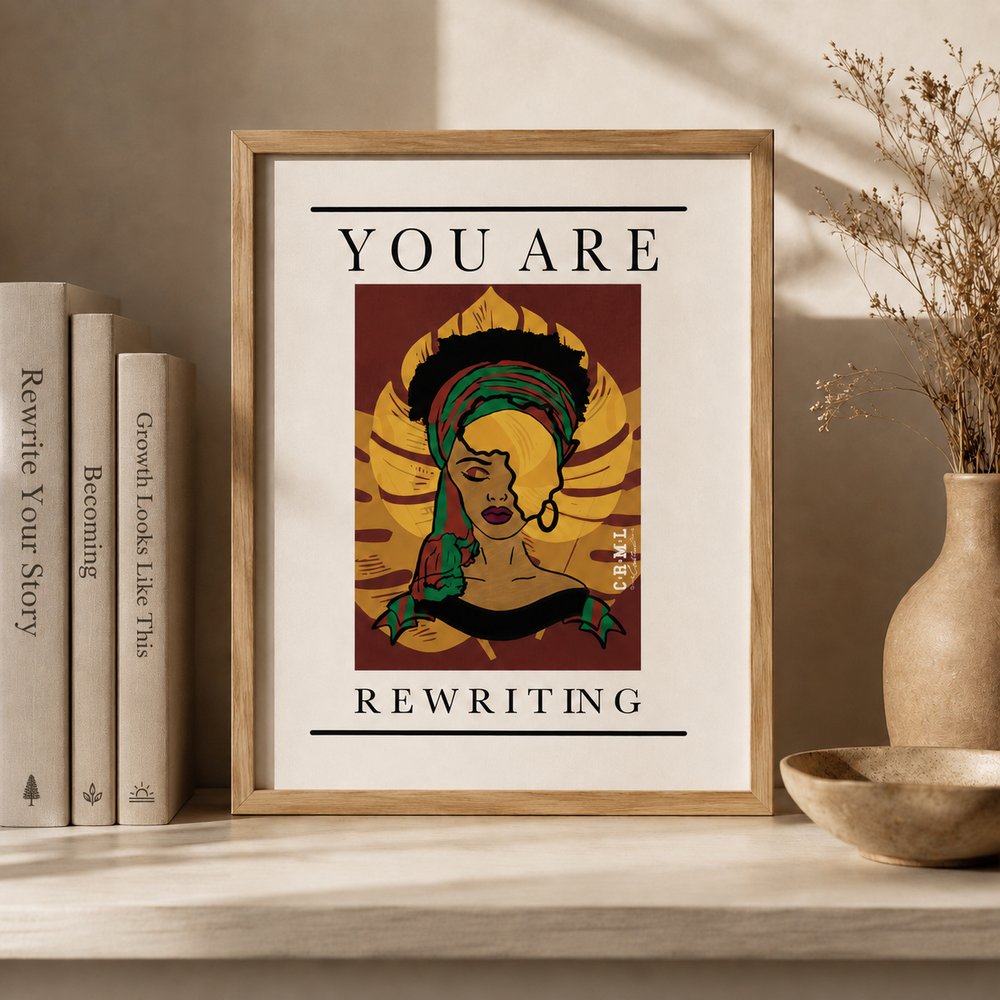 ‘You Are Rewriting’ affirmation art print in a wooden frame on a shelf